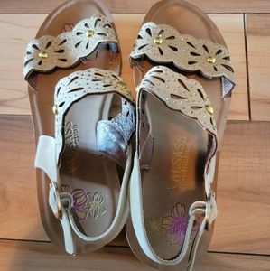 Well worn used woman sandals